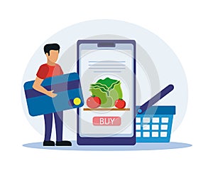 Young customer paying for online purchases with credit card, buying fresh food