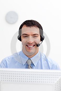 Young customer service agent with headset on