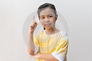 Young and cute Asian little girl thinking