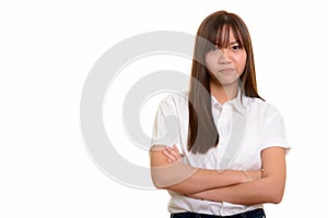 Young cute Asian teenage girl looking angry