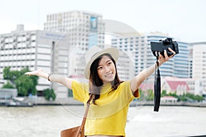 Young cute asian woman travler in casual style making camera selfie in the urban city outdoors background, woman selfie,  people photo