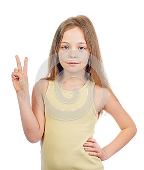 Young cute girl with long light brown hair shows victory sign