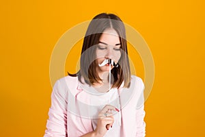 Young cute girl with moustache, studio