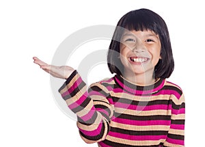 A young cute girl raise her hand and smile Isolated over white