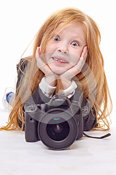 Young cute serious photographer