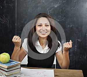 Young cute tanned teenage girl happy pointing, thinking, education concept