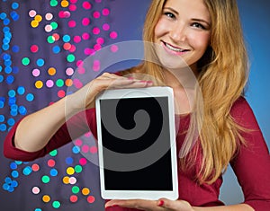 Young cute woman showing digital tablet