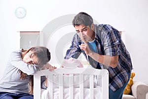 The young dad cannot stand baby crying