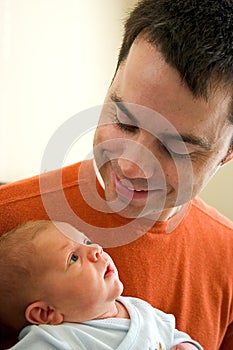 Young Dad with Infant Son photo