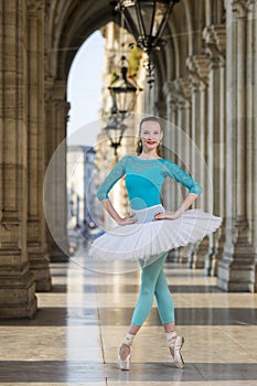 Young dancer with tutu and turqoise trikot