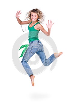 Young dancer woman jumping against white