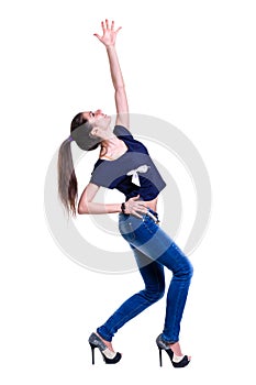 Young dancing girl isolated on a white background