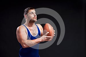 Young dark-haired male wrestler