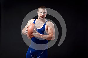 Young dark-haired male wrestler