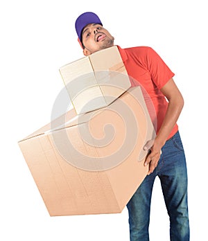 Young delivery man carrying carton boxes in uniform