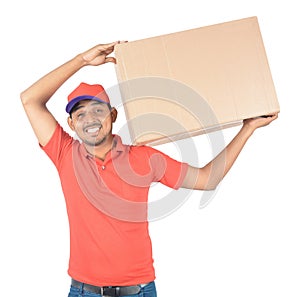 Young delivery man holding carton box in uniform