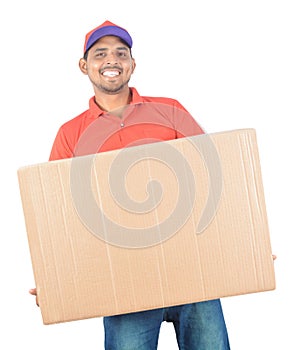 Young delivery man holding carton box in uniform
