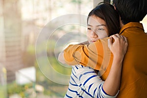 Young depressed asian woman hug her friend for encouragement, Selective focus, PTSD Mental health concept