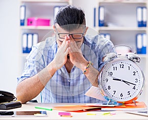 Young designer working in his studio on new project