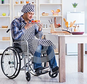 Young disabled husband preparing food salad