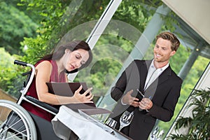 Young disabled woman alone in restaurant