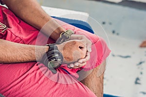 Young diver preparing an underwater compass for diving