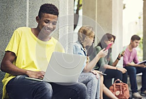 Young Diverse Group Studying Outdoors Concept