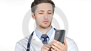 Young Doctor Browsing Smartphone, White Background