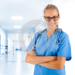 Young doctor in clinic's corridor