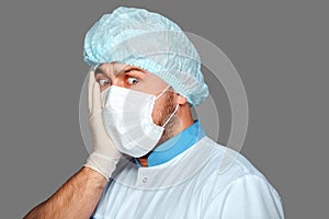 Young doctor with container for analysis