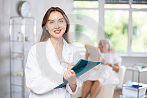 Young doctor with folder