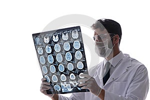 The young doctor looking at x-ray images isolated on white