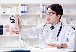 Young doctor in medical insurance fraud concept