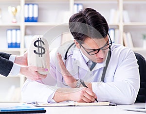 Young doctor in medical insurance fraud concept