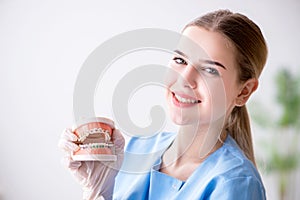 The young doctor nurse with dentures