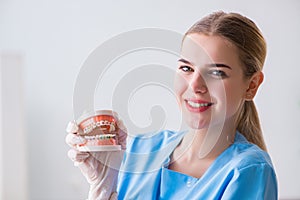 The young doctor nurse with dentures