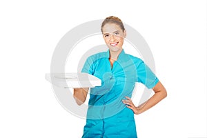 Young doctor or nurse holding weight