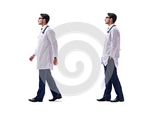 The young doctor physician standing walking isolated on white background