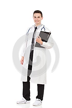 Young doctor posing with a clipboard