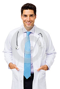 Young Doctor Standing With Hands In Pockets