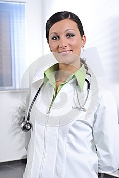 young doctor with stethoscope photo