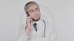 Young Doctor Talking on Phone on White Background