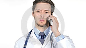 Young Doctor Talking on Smartphone, White Background