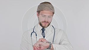 Young Doctor Using Smartwatch on White Background