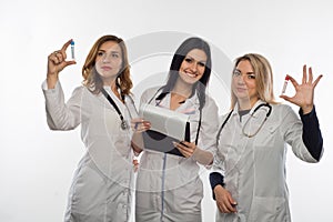 Young doctor on white background