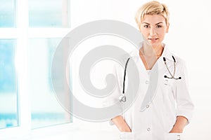 Young doctor in white coat