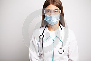 Young doctor woman tired after work at her workplace