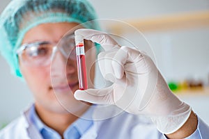 The young doctor working on blood test in lab hospital