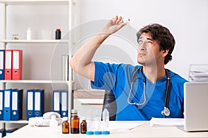 The young doctor working in the hospital