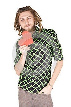 Young dreadlock man with red paper heart isolated photo